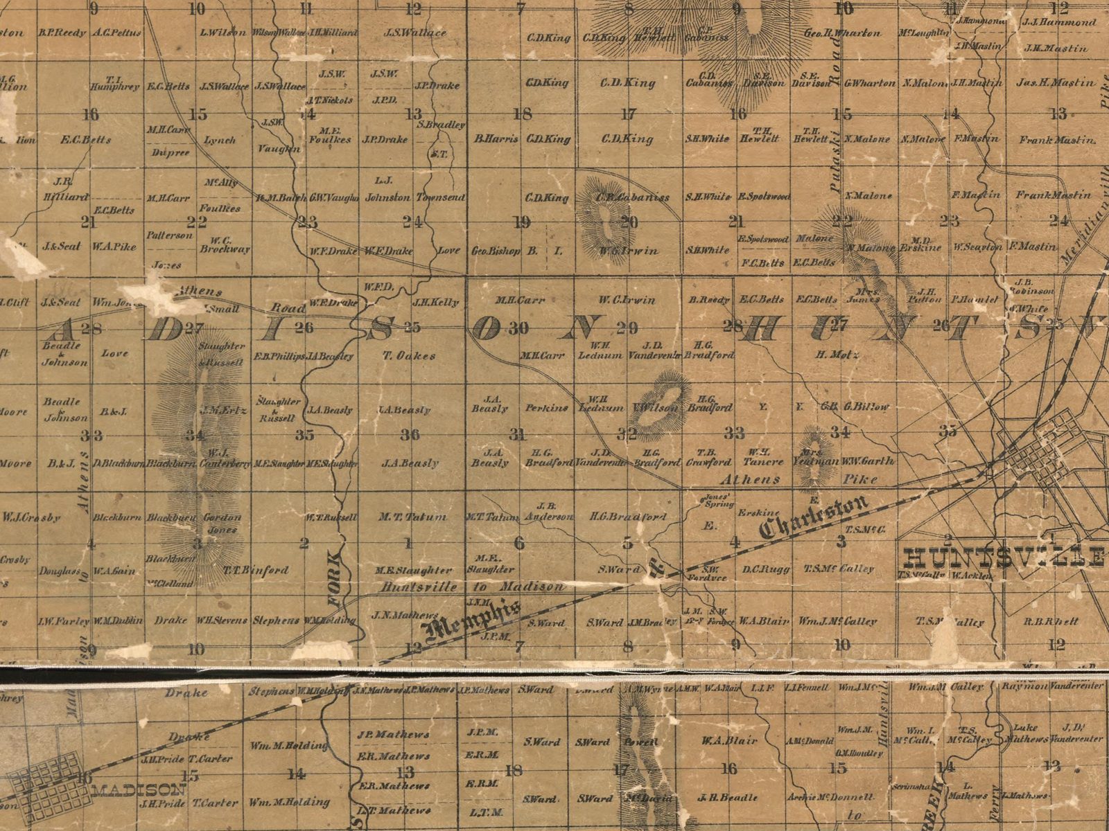 Detail of the 1875 Map of Madison County, Alabama: landowner parcels in the townships west of Huntsville, including parcels labeled Jones and Wm. Jones along the Athens Road, and Jones' Spring
